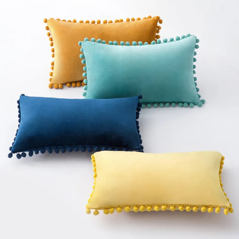 Yale Pillow Cover – luxurious velvet pillow cover with a small pom-pom border, available in multiple colors and sizes, adding a soft boho vibe to any room.