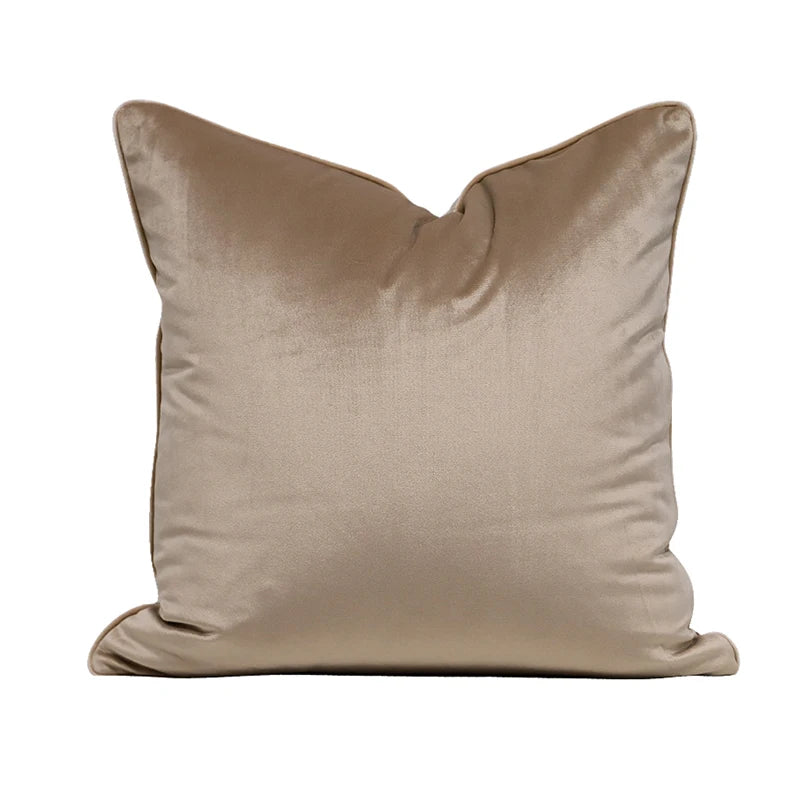 A collection of Bernadette Pillow Covers in various sizes and deep jewel tones, each crafted with a luxurious velvet feel. Made from 100% polyester, these pillow covers offer a rich and sophisticated look, perfect for home décor enthusiasts. Displayed on a sofa, the covers showcase their vibrant colorways and soft texture, ideal for adding elegance and comfort to any room. Pillow inserts are not included, allowing for customizable use and styling.