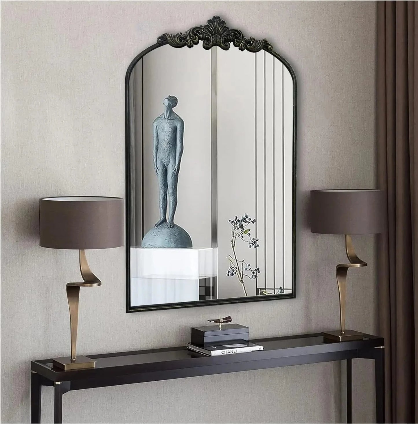Addison Mirror featuring a vintage-inspired arched design with a sturdy black or brass iron frame. This elegant mirror is perfect for home décor enthusiasts, adding a touch of classic charm and sophistication to any room. Ideal for enhancing entryways, living rooms, or bedrooms, it serves both functional and decorative purposes.