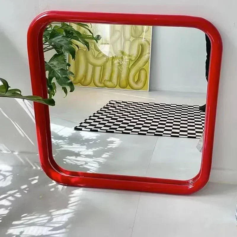 Uri Mirror – square mirror with rounded corners, vibrant colorways, and a retro-inspired design, available in small (60x60 cm) and large (80x80 cm) sizes.