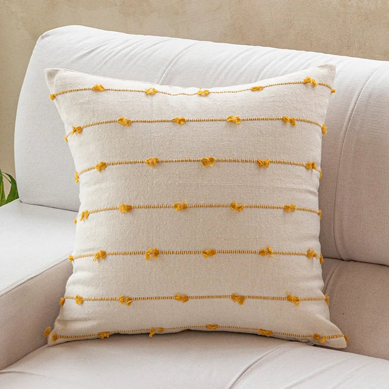 Elegant Irene Pillow Cover with cream neutral base and colored striped detailing, available in two sizes. Made from soft, high-quality cotton. Ideal for home decor enthusiasts, perfect for adding style to living rooms and bedrooms. Does not include filler.