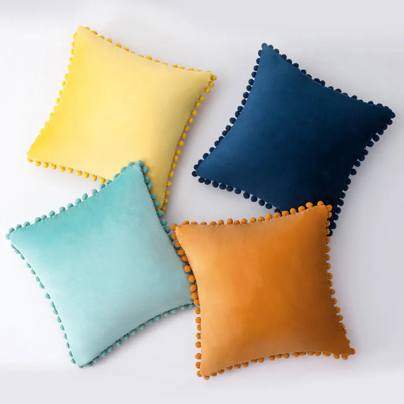 Yale Pillow Cover – luxurious velvet pillow cover with a small pom-pom border, available in multiple colors and sizes, adding a soft boho vibe to any room.