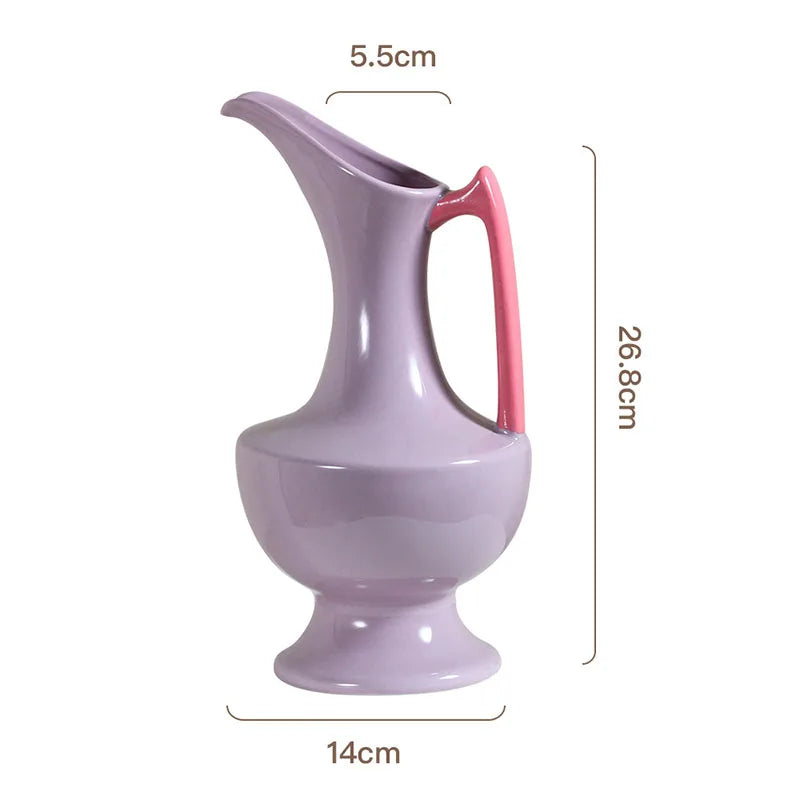 Colorful ceramic vase for floral display, bright décor accent.