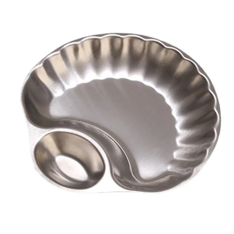 Elegant stainless steel Isadore Shell Tray with a unique shell design, featuring big and small sections for serving snacks, appetizers, or desserts. Perfect for entertaining, tableware with a vintage feel, and hosting in style. Compact yet versatile silver tray ideal for modern and sophisticated dining setups.