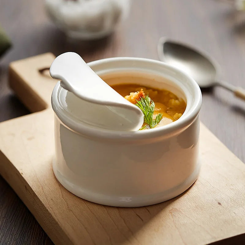 Clara Ramekin – small white ceramic ramekin with a unique tin can-inspired design, perfect for serving desserts, soups, or individual portions with playful elegance.