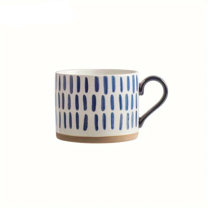 Vix Mug – 13oz cream ceramic mug with indigo-printed design, available in four unique styles, perfect for enjoying coffee, tea, or as a decorative piece.