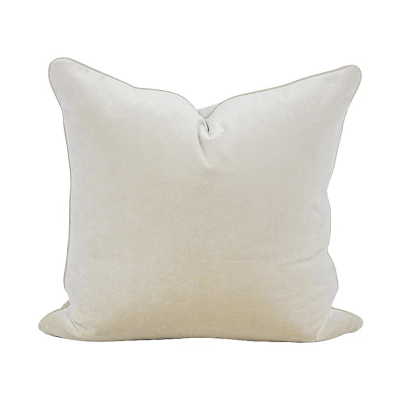 A collection of Bernadette Pillow Covers in various sizes and deep jewel tones, each crafted with a luxurious velvet feel. Made from 100% polyester, these pillow covers offer a rich and sophisticated look, perfect for home décor enthusiasts. Displayed on a sofa, the covers showcase their vibrant colorways and soft texture, ideal for adding elegance and comfort to any room. Pillow inserts are not included, allowing for customizable use and styling.
