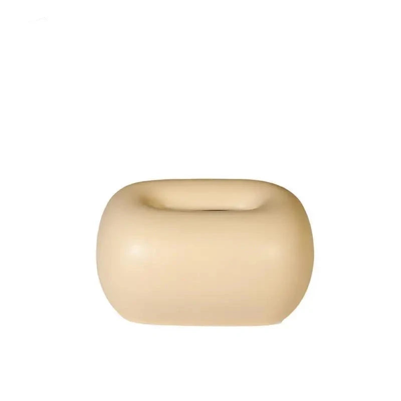 Rounded ceramic tissue box in a modern, minimalist design with four colorway options. A sleek and stylish home décor piece, perfect for living rooms, bedrooms, offices, or bathrooms.
