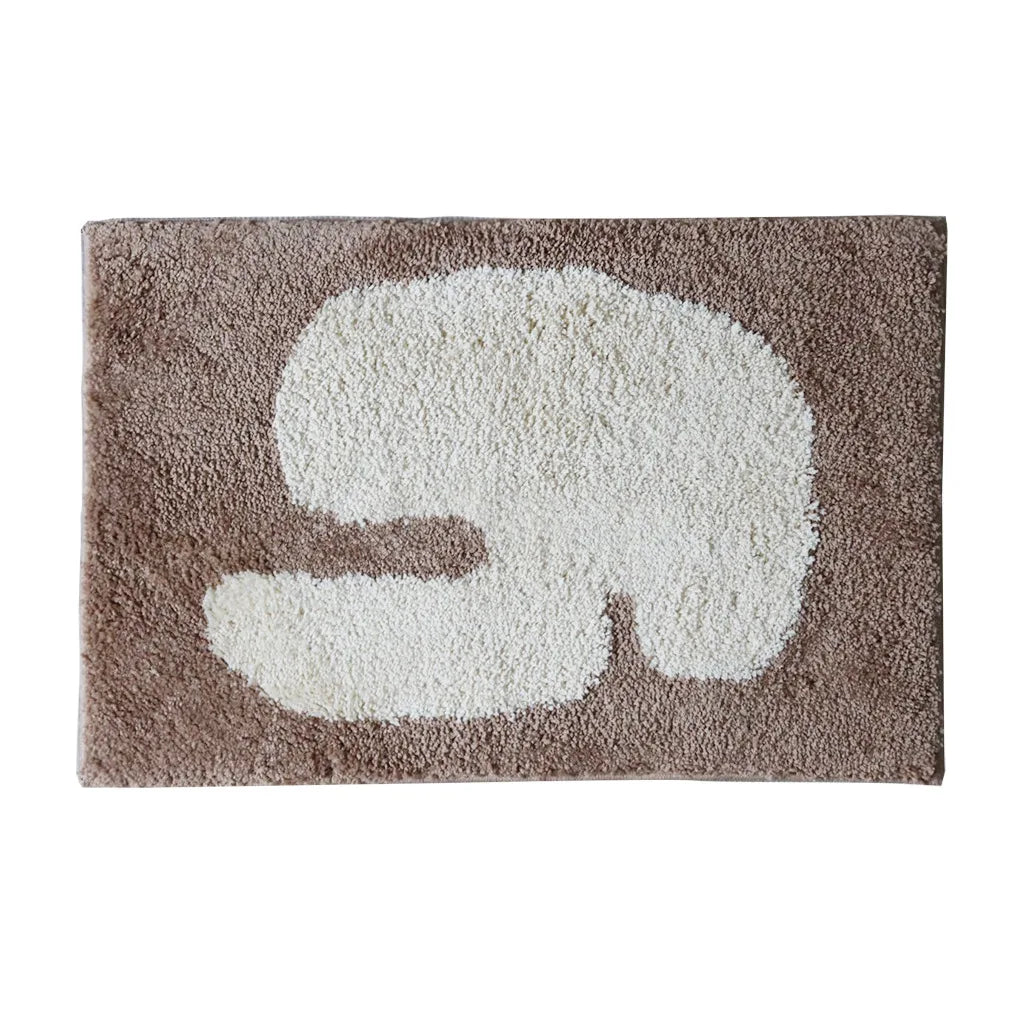 Oaklee Bath Mat featuring a plush, soft texture in various graphic styles and colors. Made from absorbent polyester with anti-slip backing, this minimalistic bath mat enhances bathroom décor while providing comfort and safety. Ideal for home décor enthusiasts seeking both style and functionality for their bathroom floor.