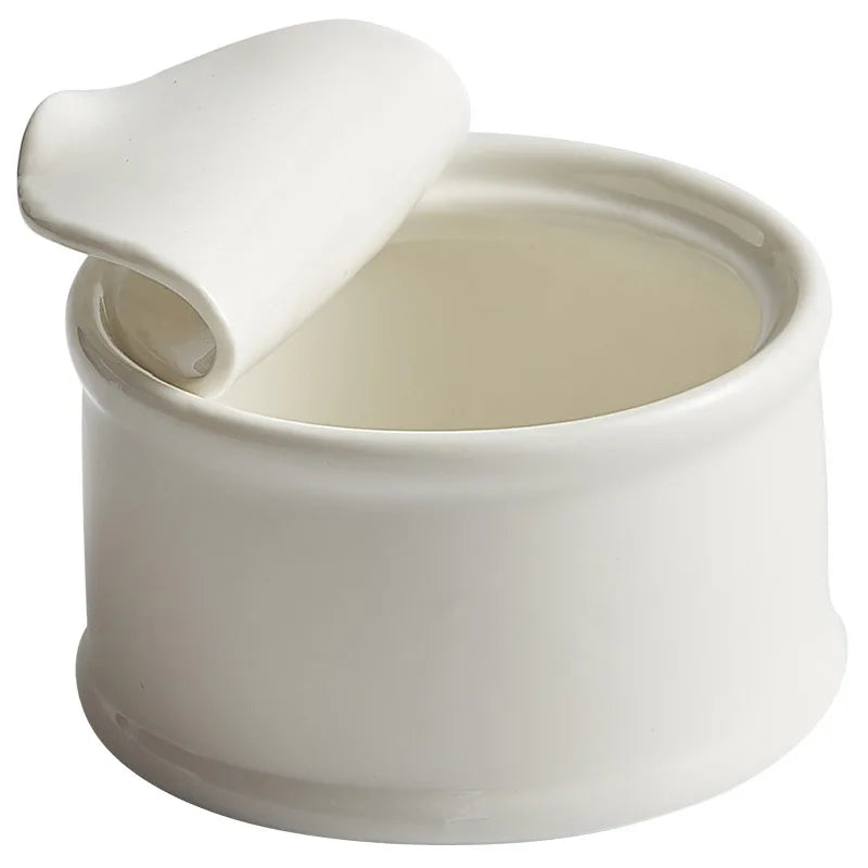 Clara Ramekin – small white ceramic ramekin with a unique tin can-inspired design, perfect for serving desserts, soups, or individual portions with playful elegance.