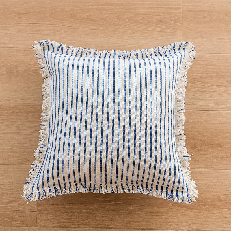Mandy Pillow Cover – square pillow cover with striped patterns, fringed edges, and a polyester/cotton blend, available in six colorways for a cozy, stylish touch.