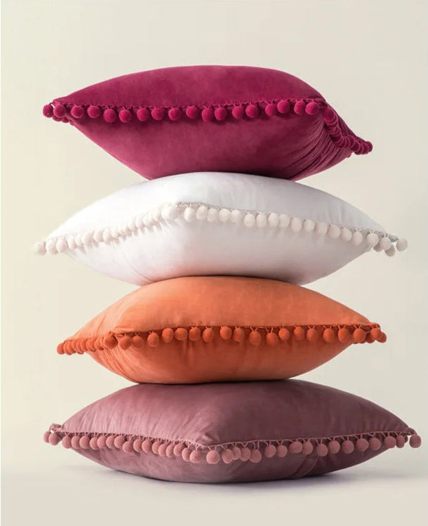 Yale Pillow Cover – luxurious velvet pillow cover with a small pom-pom border, available in multiple colors and sizes, adding a soft boho vibe to any room.