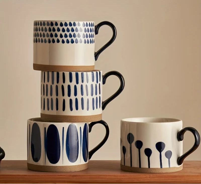 Vix Mug – 13oz cream ceramic mug with indigo-printed design, available in four unique styles, perfect for enjoying coffee, tea, or as a decorative piece.