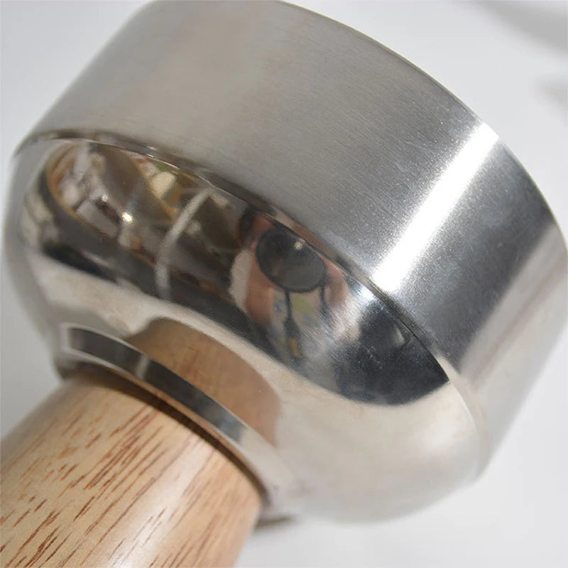 Eddard Serving Bowl featuring a modern design with a sleek stainless steel bowl and a sturdy wooden base. Compact and stylish, this small serving bowl is perfect for home decor enthusiasts looking to add a chic touch to their kitchen or coffee table. Ideal for serving snacks, fruits, or side dishes.