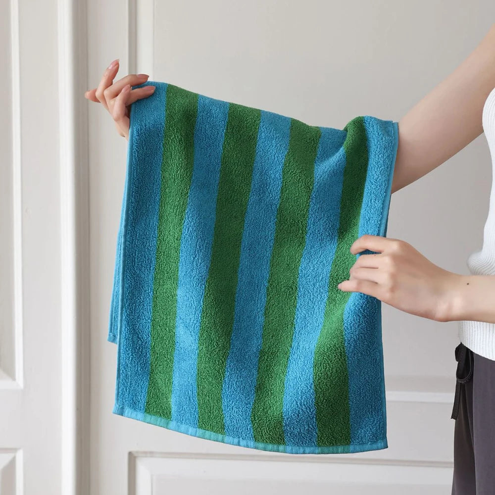 Myco Towel – retro striped towel in vibrant colorways, made from 100% cotton for softness and absorbency, available in hand towel and bath towel sizes.