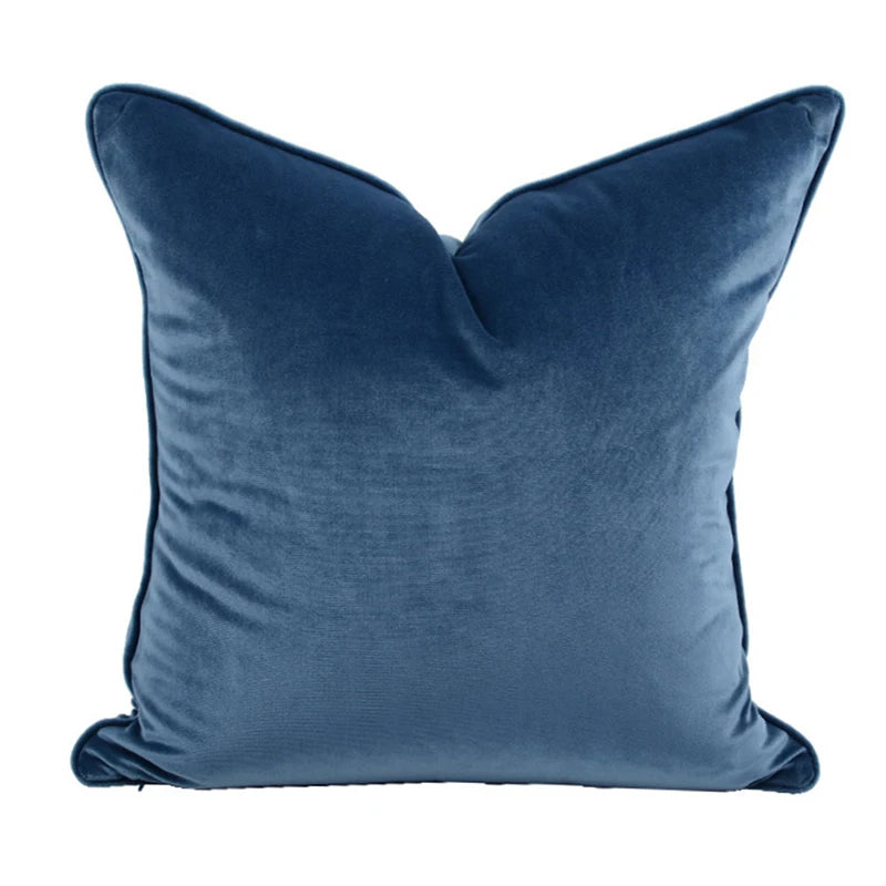A collection of Bernadette Pillow Covers in various sizes and deep jewel tones, each crafted with a luxurious velvet feel. Made from 100% polyester, these pillow covers offer a rich and sophisticated look, perfect for home décor enthusiasts. Displayed on a sofa, the covers showcase their vibrant colorways and soft texture, ideal for adding elegance and comfort to any room. Pillow inserts are not included, allowing for customizable use and styling.