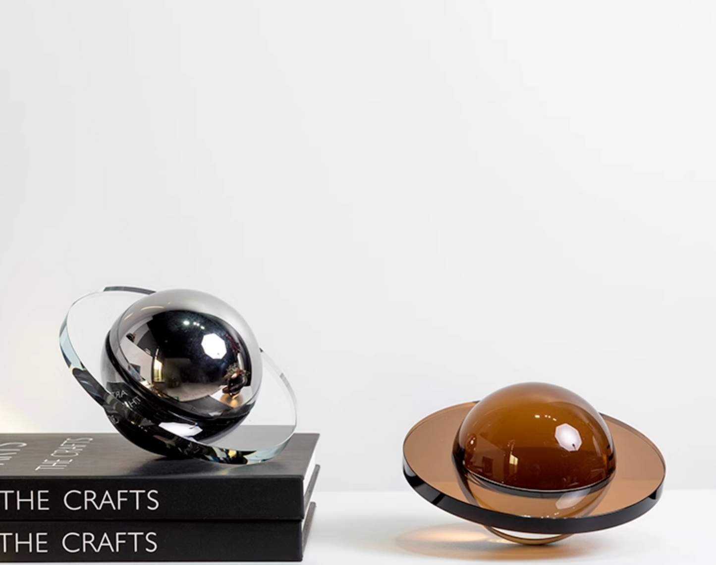 Modern crystal Flying Saucer Decorative Object in silver or brown finish. A captivating blend of contemporary design and cosmic inspiration, ideal for adding a unique touch to your space.