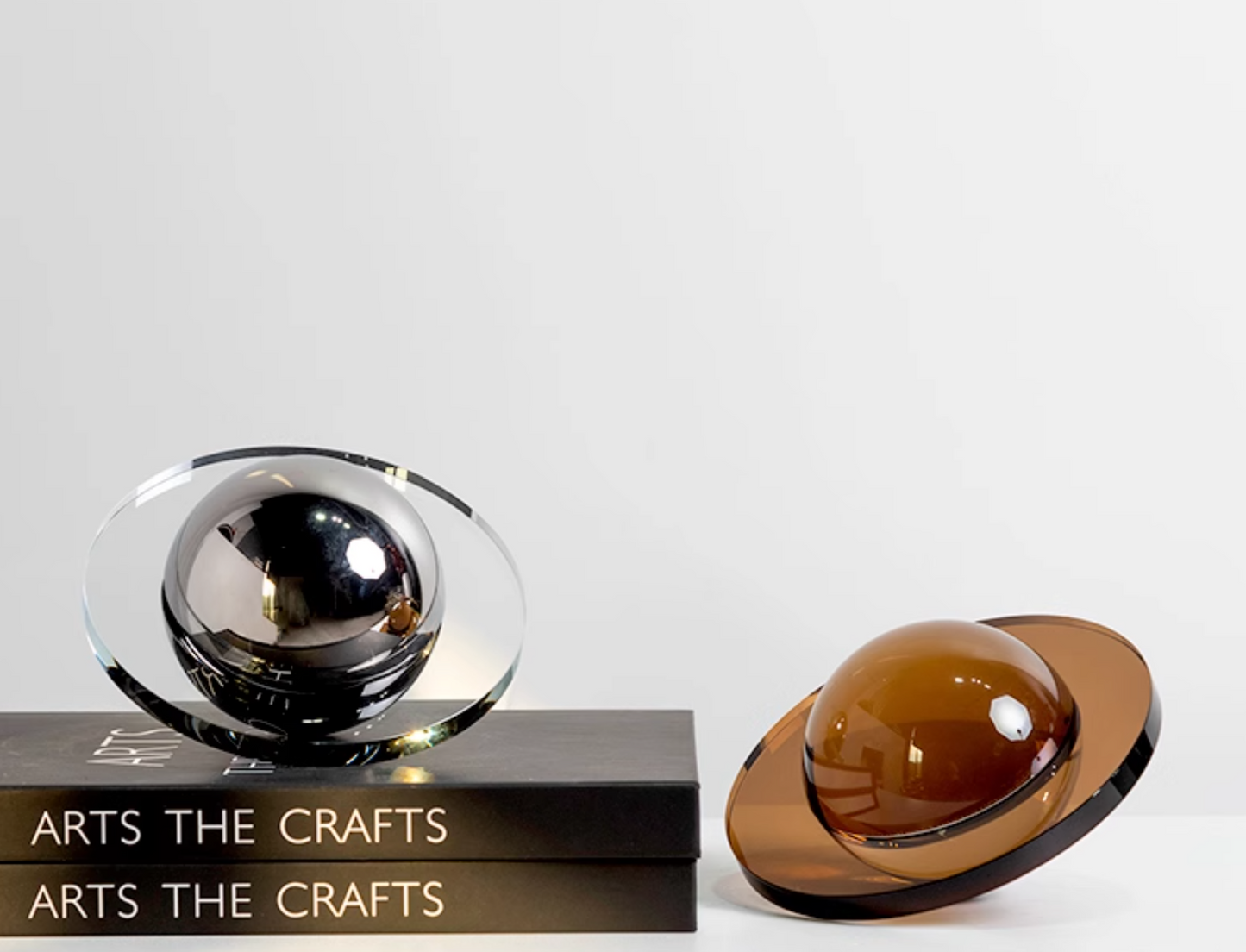 Modern crystal Flying Saucer Decorative Object in silver or brown finish. A captivating blend of contemporary design and cosmic inspiration, ideal for adding a unique touch to your space.