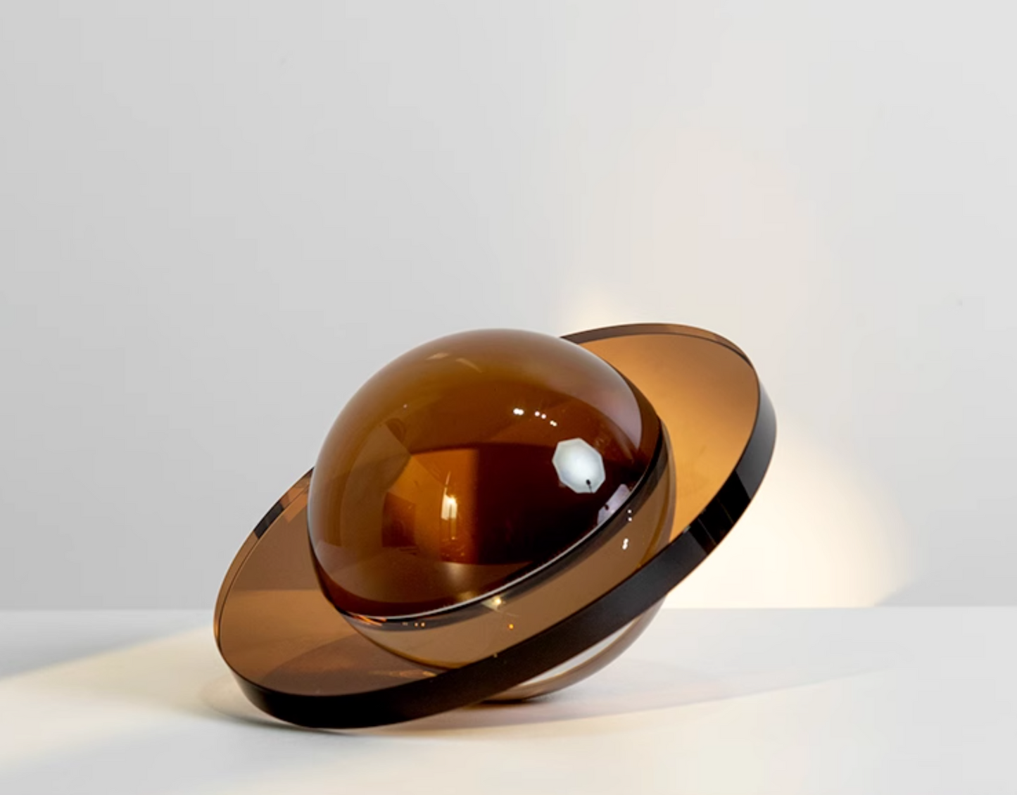 Modern crystal Flying Saucer Decorative Object in silver or brown finish. A captivating blend of contemporary design and cosmic inspiration, ideal for adding a unique touch to your space.