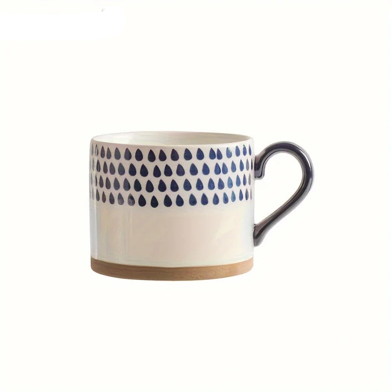 Vix Mug – 13oz cream ceramic mug with indigo-printed design, available in four unique styles, perfect for enjoying coffee, tea, or as a decorative piece.