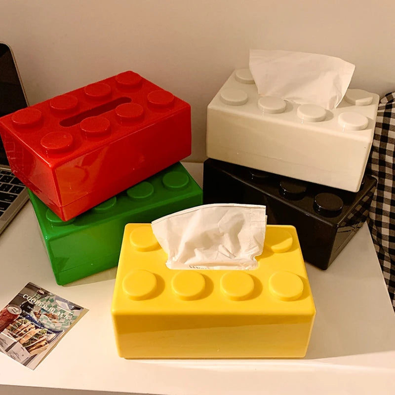 Colorful Fallon Tissue Box in playful building block shape – perfect for kids' rooms and adding a fun touch to any space.