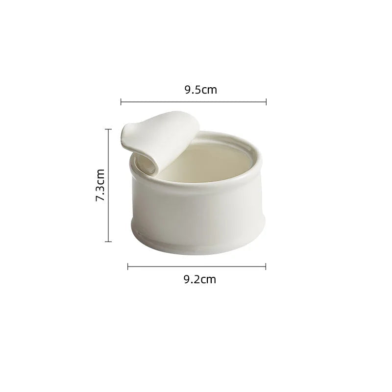 Clara Ramekin – small white ceramic ramekin with a unique tin can-inspired design, perfect for serving desserts, soups, or individual portions with playful elegance.