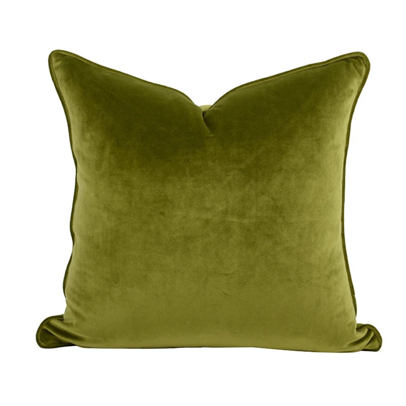 A collection of Bernadette Pillow Covers in various sizes and deep jewel tones, each crafted with a luxurious velvet feel. Made from 100% polyester, these pillow covers offer a rich and sophisticated look, perfect for home décor enthusiasts. Displayed on a sofa, the covers showcase their vibrant colorways and soft texture, ideal for adding elegance and comfort to any room. Pillow inserts are not included, allowing for customizable use and styling.