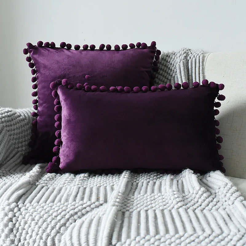 Yale Pillow Cover – luxurious velvet pillow cover with a small pom-pom border, available in multiple colors and sizes, adding a soft boho vibe to any room.