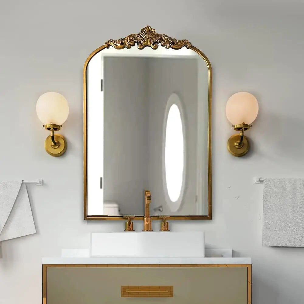 Addison Mirror featuring a vintage-inspired arched design with a sturdy black or brass iron frame. This elegant mirror is perfect for home décor enthusiasts, adding a touch of classic charm and sophistication to any room. Ideal for enhancing entryways, living rooms, or bedrooms, it serves both functional and decorative purposes.