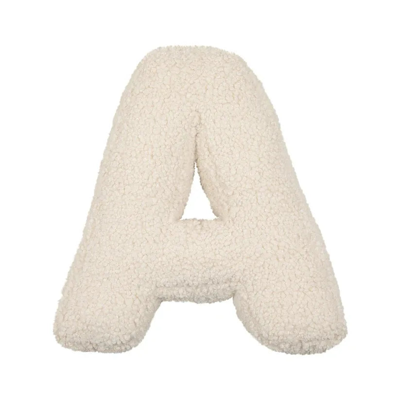 Yeats Throw Pillow – soft lambswool alphabet-shaped pillow in neutral beige, perfect for nurseries, playrooms, and kids' rooms as a cozy and educational accent.