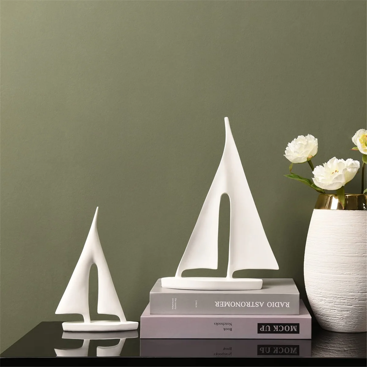 Zaz Sailboat Decorative Object – set of two white resin sailboats in small and large sizes, featuring a modern minimalist design, perfect for coastal-inspired décor.