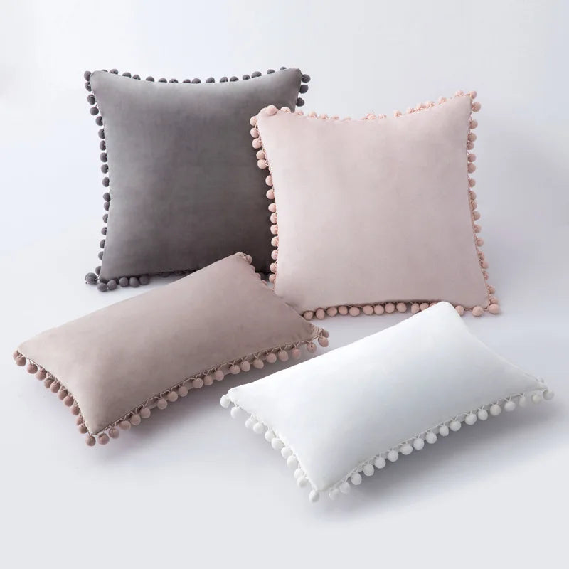 Yale Pillow Cover – luxurious velvet pillow cover with a small pom-pom border, available in multiple colors and sizes, adding a soft boho vibe to any room.