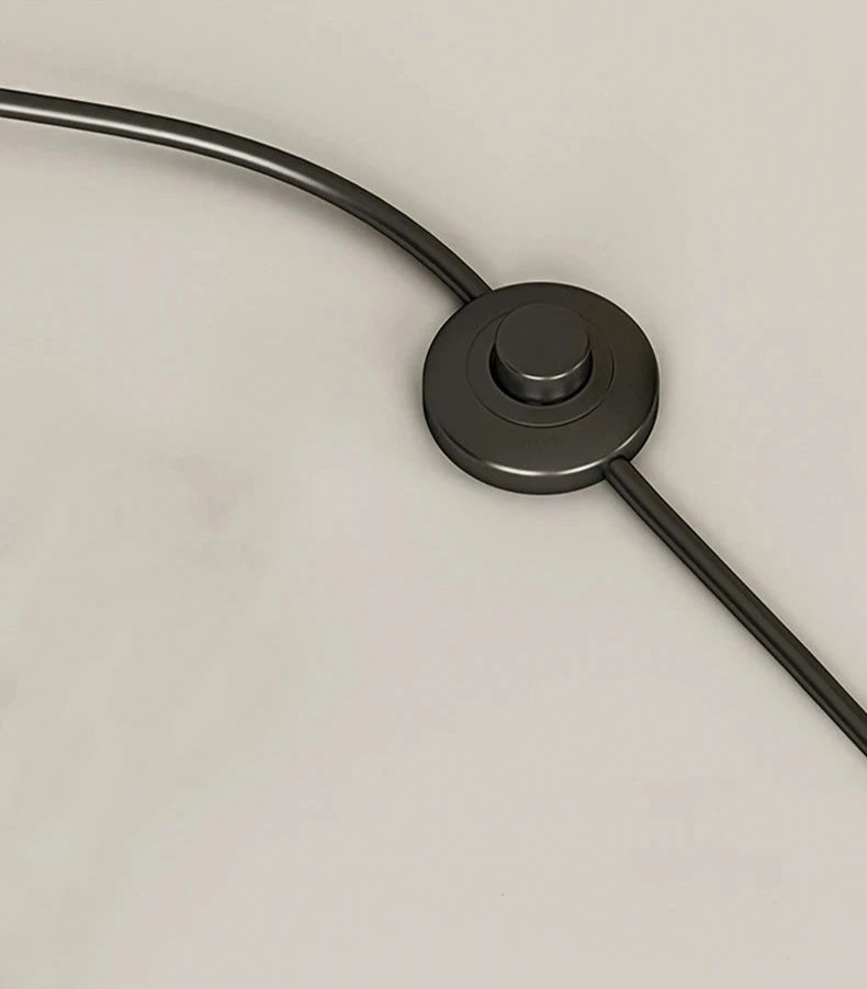 Image of the Tully Floor Lamp featuring a sleek, modern design with bright colorways. The lamp has a unique mushroom shape, made from durable metal, and includes an easy-to-use button switch. Perfect for home décor enthusiasts looking to add stylish accent lighting to their space.