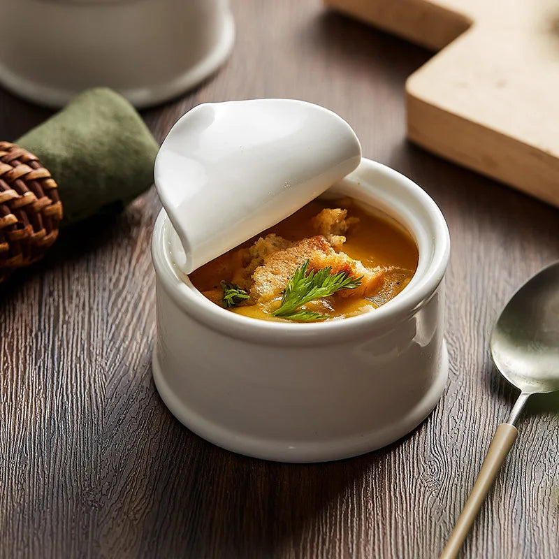 Clara Ramekin – small white ceramic ramekin with a unique tin can-inspired design, perfect for serving desserts, soups, or individual portions with playful elegance.