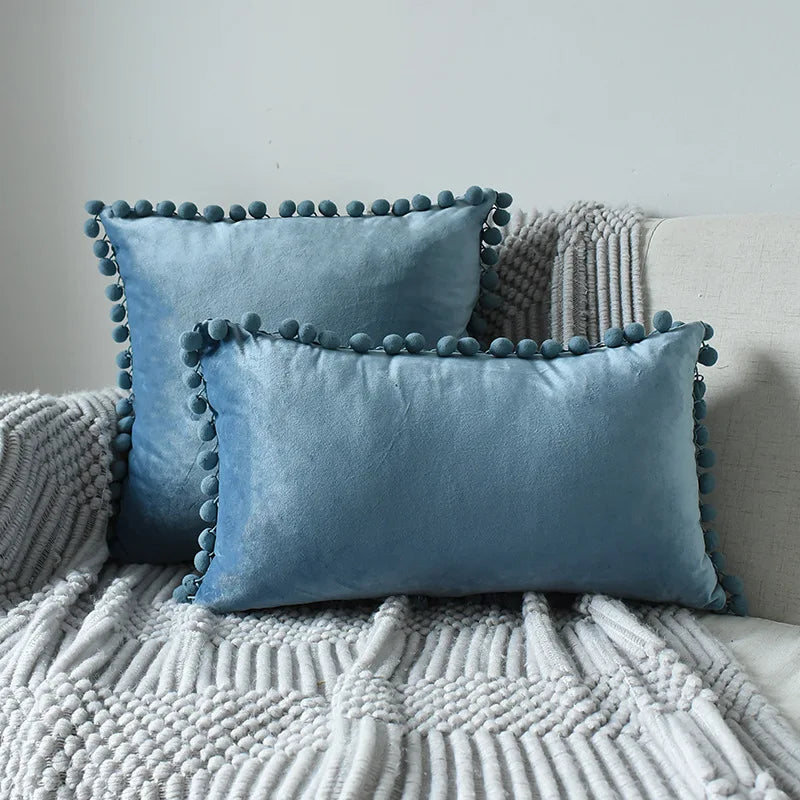 Yale Pillow Cover – luxurious velvet pillow cover with a small pom-pom border, available in multiple colors and sizes, adding a soft boho vibe to any room.