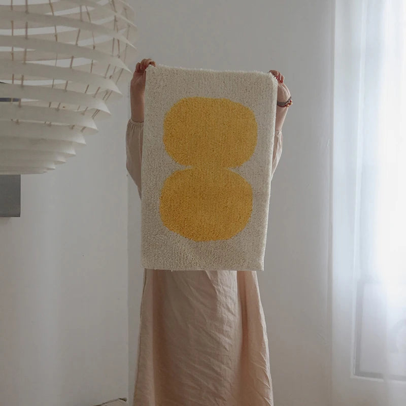 Oaklee Bath Mat featuring a plush, soft texture in various graphic styles and colors. Made from absorbent polyester with anti-slip backing, this minimalistic bath mat enhances bathroom décor while providing comfort and safety. Ideal for home décor enthusiasts seeking both style and functionality for their bathroom floor.