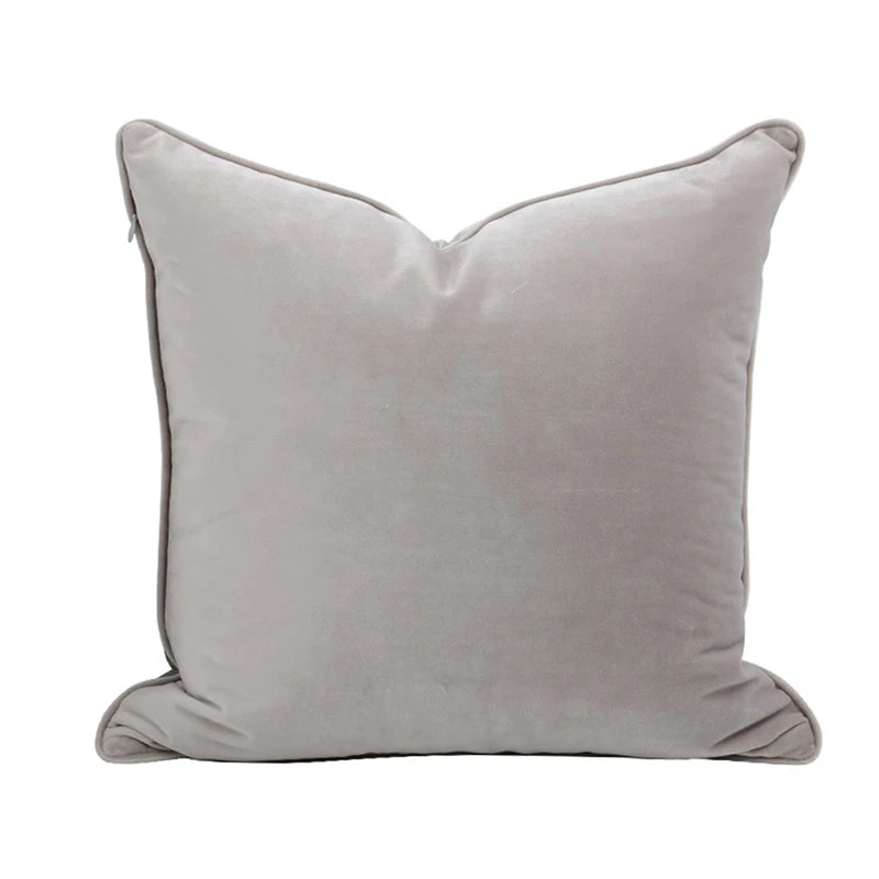 A collection of Bernadette Pillow Covers in various sizes and deep jewel tones, each crafted with a luxurious velvet feel. Made from 100% polyester, these pillow covers offer a rich and sophisticated look, perfect for home décor enthusiasts. Displayed on a sofa, the covers showcase their vibrant colorways and soft texture, ideal for adding elegance and comfort to any room. Pillow inserts are not included, allowing for customizable use and styling.