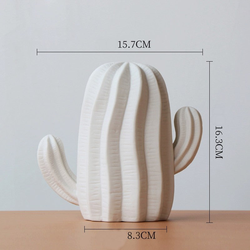 Chic ceramic cacti décor - statement piece with 3 types in neutral colors, perfect for style.