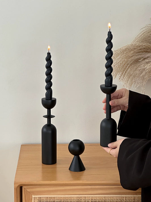 Farrah Candle Holder Collection in matte black, featuring modern geometric design. Available in three distinct shapes and sizes. Elevate your décor with this stylish and versatile candlestick. Can be purchased individually or as a set.