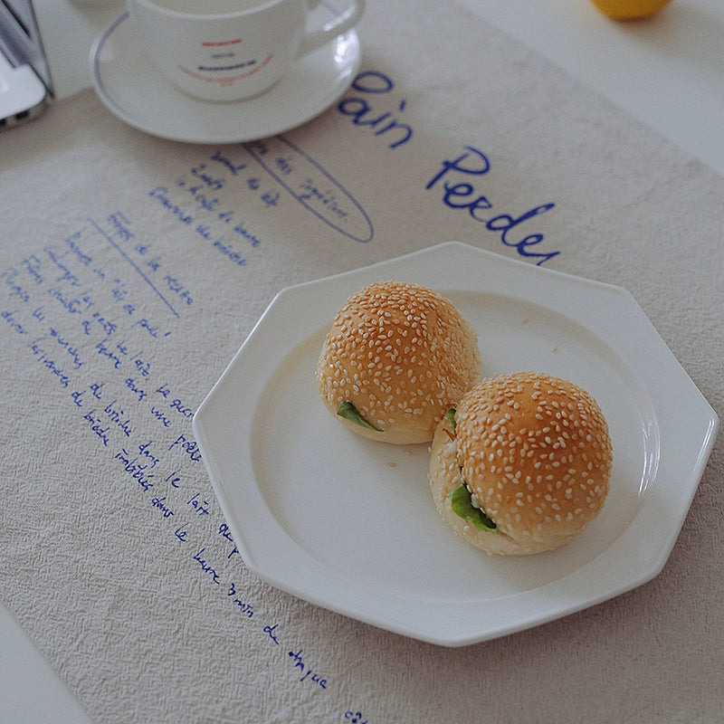 Pain Perdu Placemats - 40x50 cm cotton placemats with charming French text detailing a cute Pain Perdu recipe. Available in two colorways for delightful dining experiences.