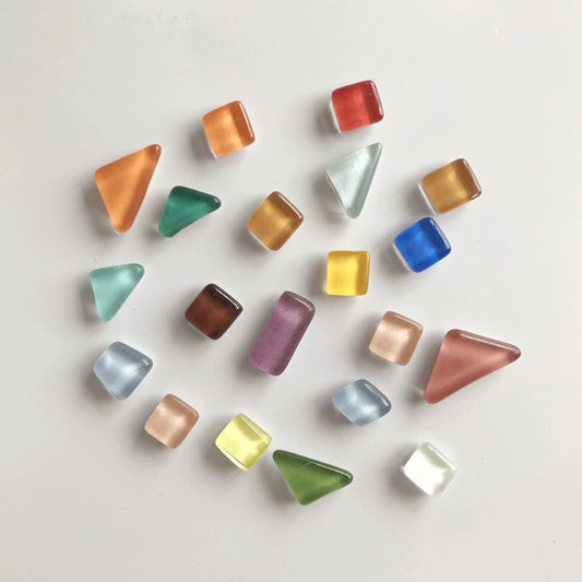 ulia Magnet Set - 20 glass magnets in various shapes and vibrant colors for fridge and office décor. Shop now at Domus Forge.