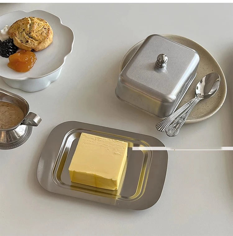 Reese Butter Dish – sleek stainless steel butter dish with a minimalist design, perfect for keeping butter fresh and adding elegance to your table.