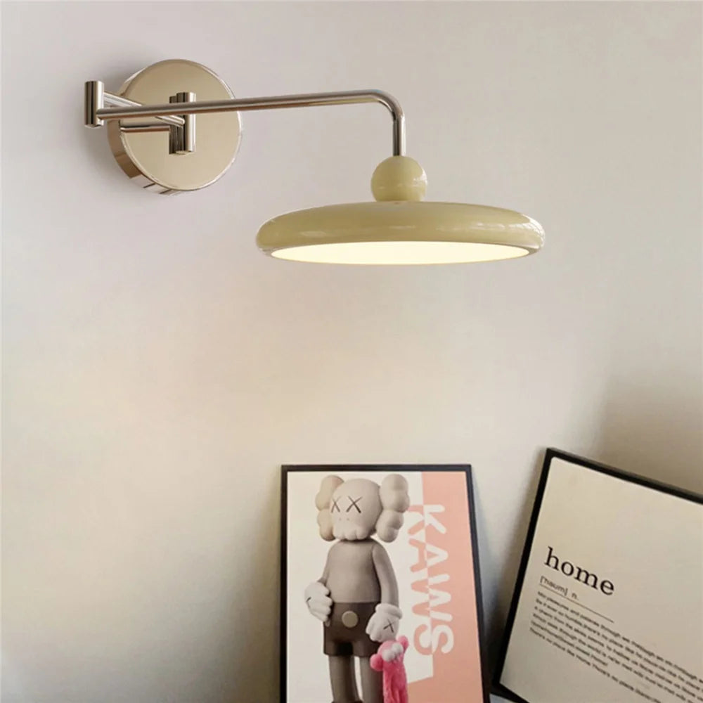 Modern Gogo Wall Lamp with silver and cream finish, ball detail, chrome accents, and swinging arm with knob switch. Ideal for cool homeowners, perfect for accent lighting in bedrooms, living rooms, or offices.