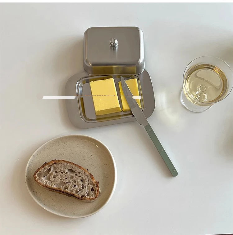 Reese Butter Dish – sleek stainless steel butter dish with a minimalist design, perfect for keeping butter fresh and adding elegance to your table.