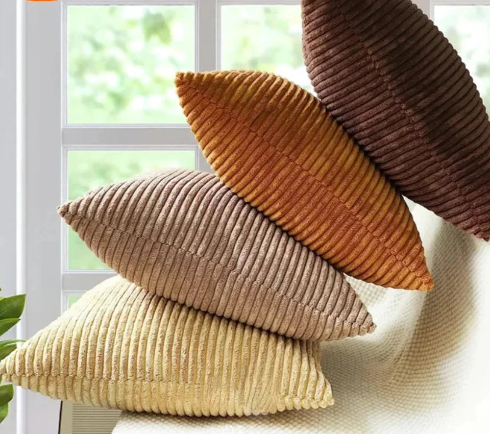 An elegant Elijah Pillow Cover featuring a soft corduroy feel in various colorways. This square pillow cover is available in multiple sizes and includes a convenient zip closure for easy cleaning. Made from a durable polyester/cotton blend, it’s perfect for updating any room in your home. Ideal for home décor enthusiasts looking to add comfort and style to their living spaces.