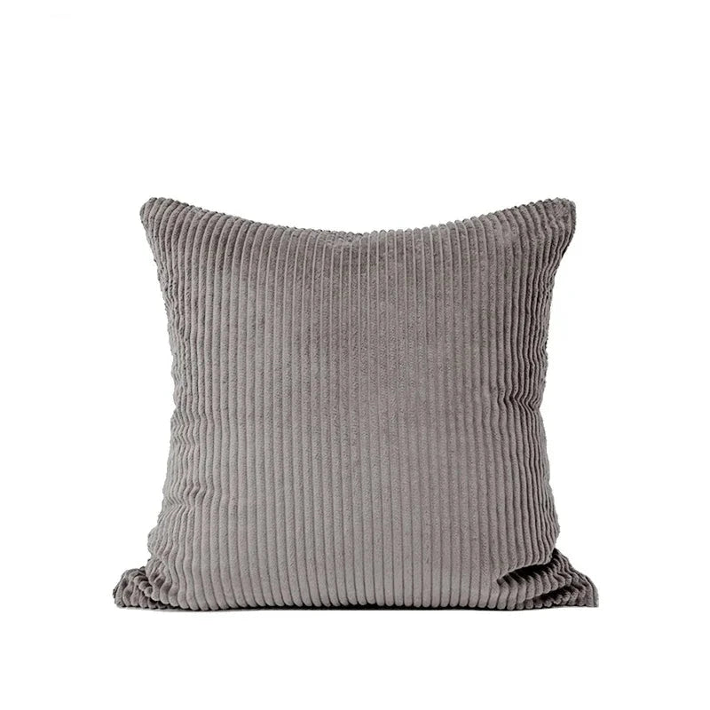 An elegant Elijah Pillow Cover featuring a soft corduroy feel in various colorways. This square pillow cover is available in multiple sizes and includes a convenient zip closure for easy cleaning. Made from a durable polyester/cotton blend, it’s perfect for updating any room in your home. Ideal for home décor enthusiasts looking to add comfort and style to their living spaces.