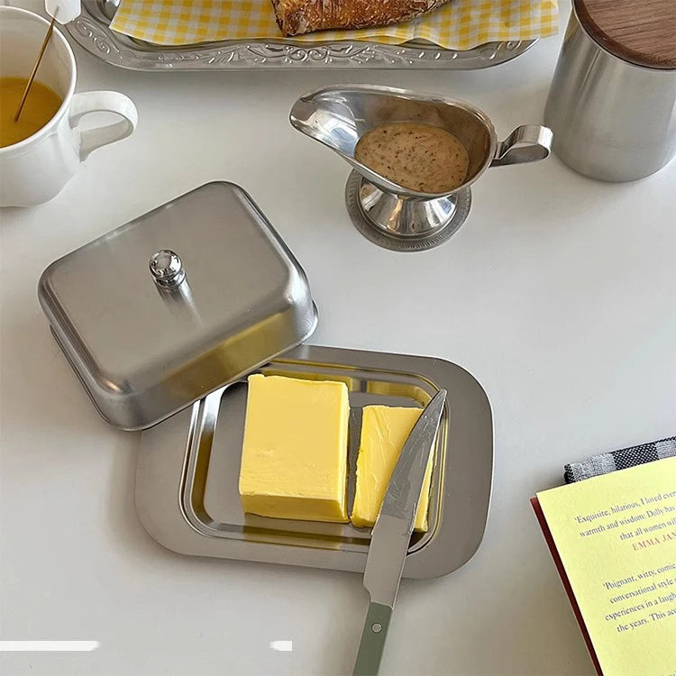 Reese Butter Dish – sleek stainless steel butter dish with a minimalist design, perfect for keeping butter fresh and adding elegance to your table.