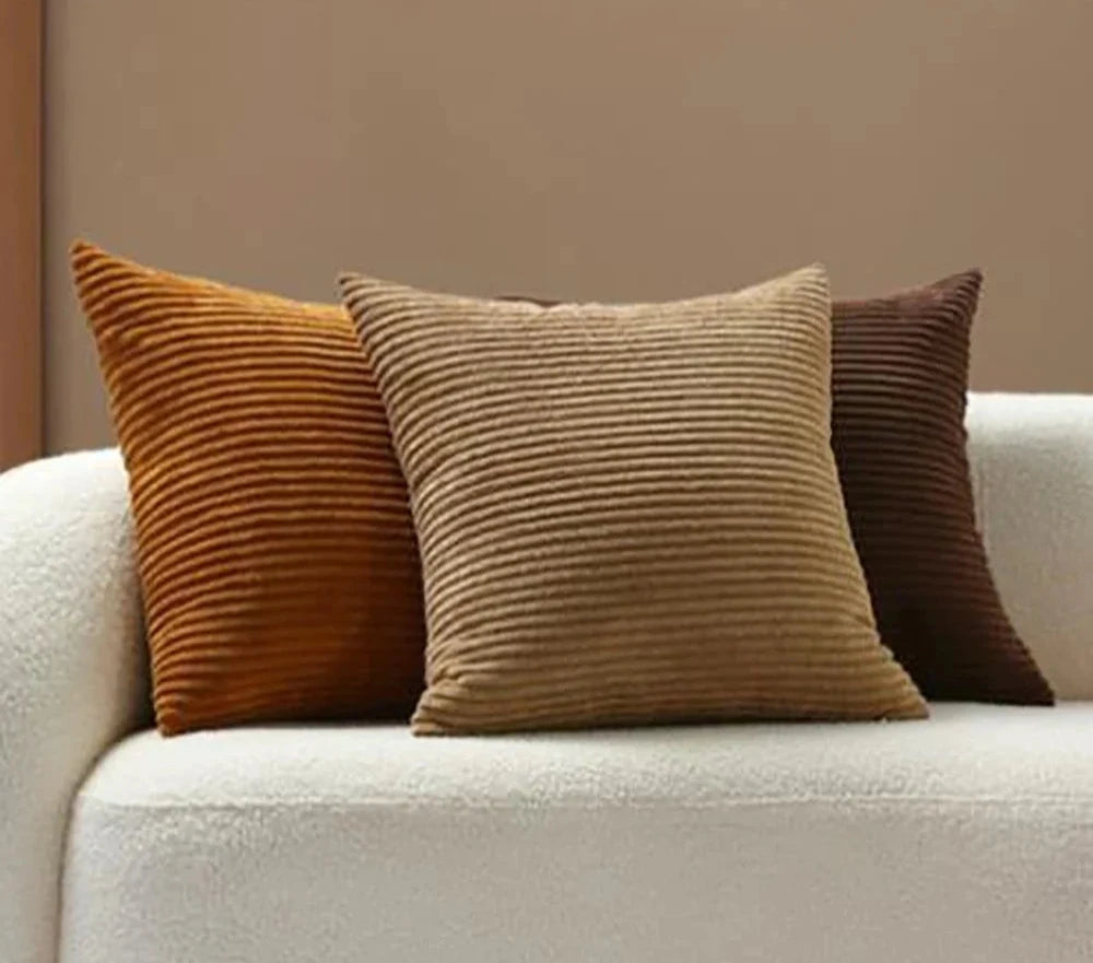 An elegant Elijah Pillow Cover featuring a soft corduroy feel in various colorways. This square pillow cover is available in multiple sizes and includes a convenient zip closure for easy cleaning. Made from a durable polyester/cotton blend, it’s perfect for updating any room in your home. Ideal for home décor enthusiasts looking to add comfort and style to their living spaces.