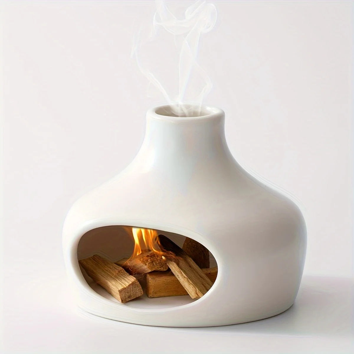 Onta Palo Santo & Sage Burner – minimalist ceramic burner with a tiny chimney design, available in black or white, perfect for compact spaces and cleansing rituals.