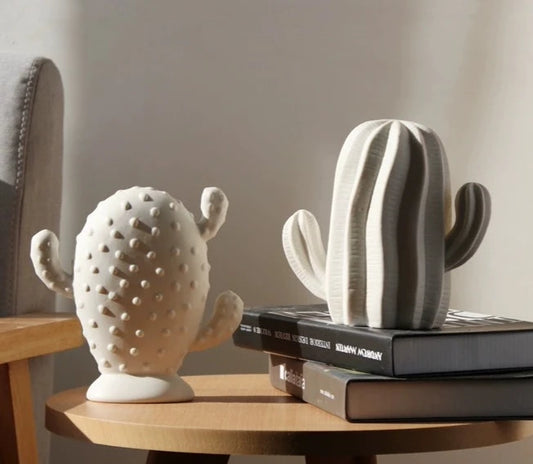 Chic ceramic cacti décor - statement piece with 3 types in neutral colors, perfect for style.